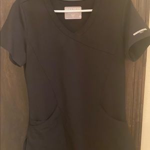Women’s black Sketchers brand scrub set